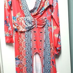 Sexy plunge neck dress with front split. Gently us